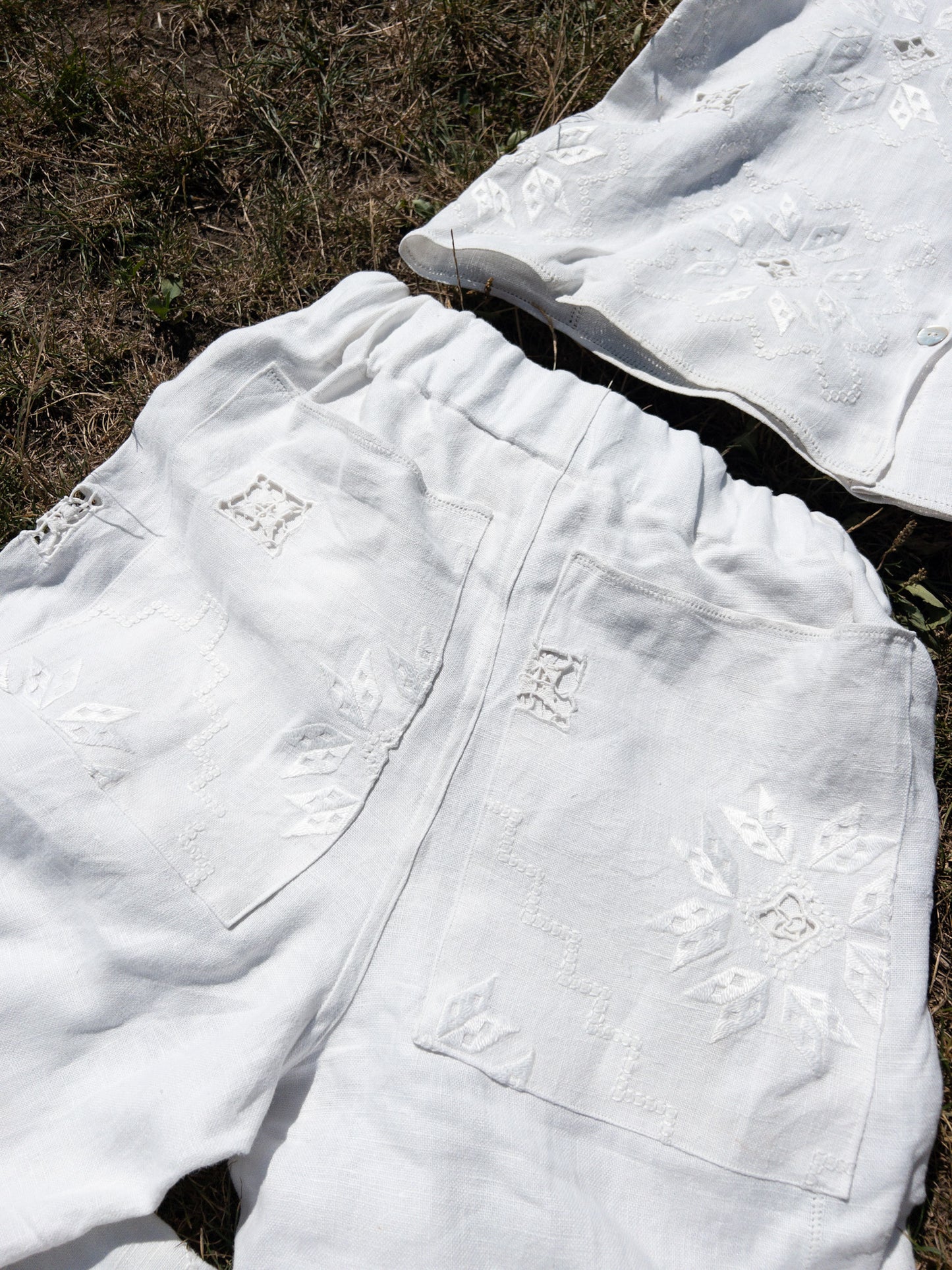 White pants with embroidery