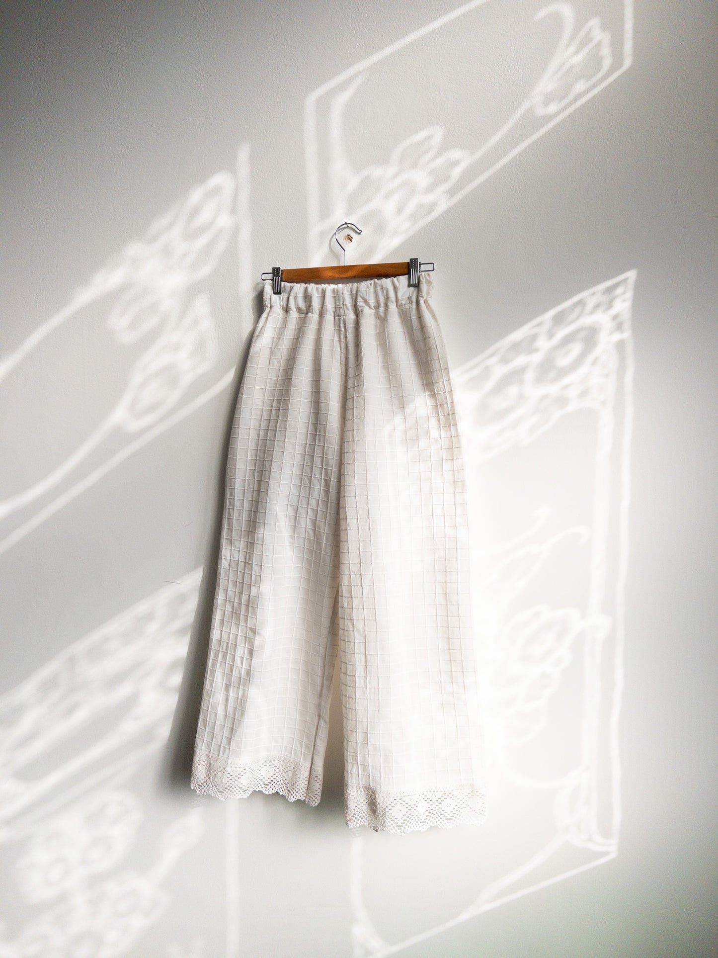 White pants with embroidery