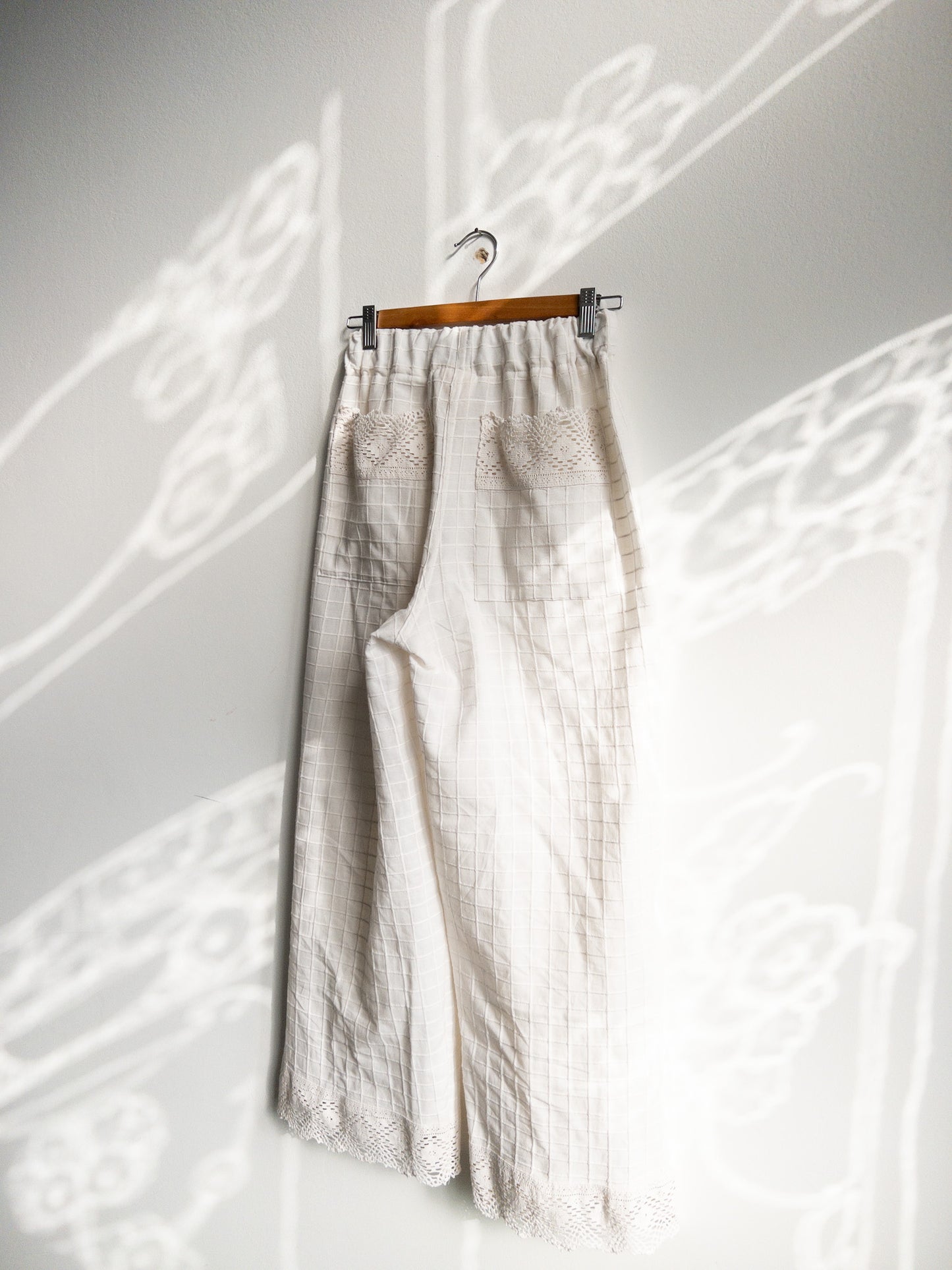 White pants with embroidery