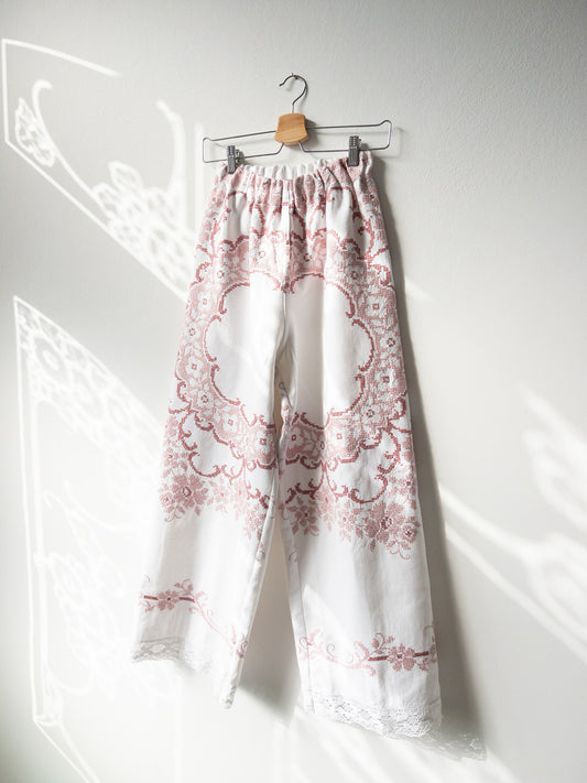 Pants with pink embroidery