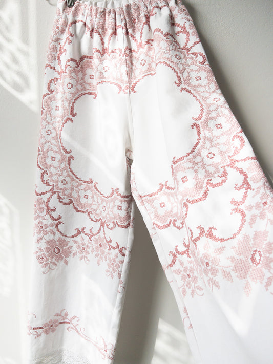 Pants with pink embroidery